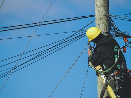 Utility worker doing maintenance during power outage